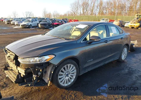 2016 Ford Fusion Hybrid Se z USA, uszkodzony, nr VIN 3FA6P0LU2GR402400